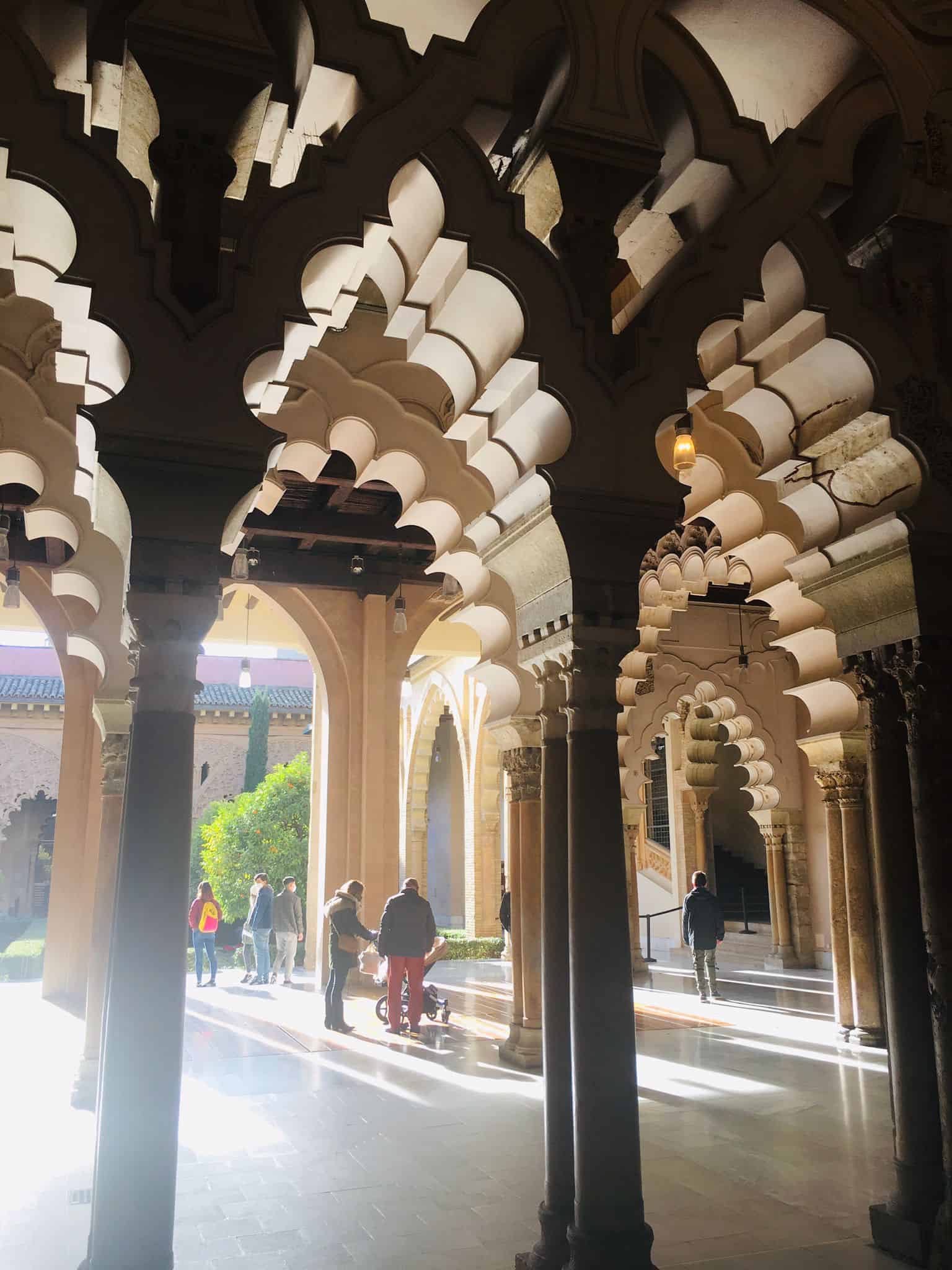 Alijaferia Palace in Zaragoza, Spain. Islamic architecture featuring horseshoe arches and marble floors.